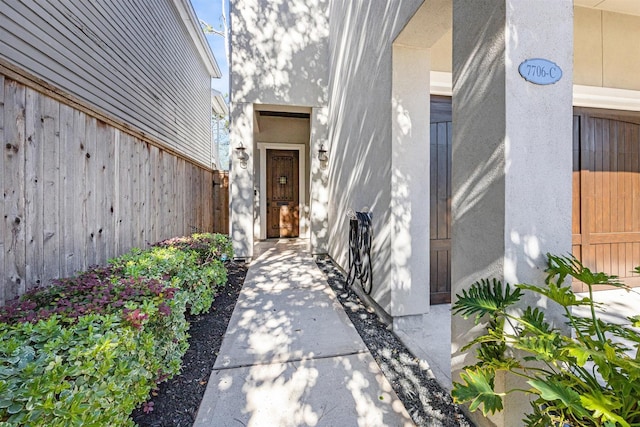 7706 Janak Dr Unit C, Houston, TX 77055 - view of exterior entry featuring stucco siding