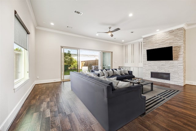 7706 Janak Dr Unit C, Houston, TX 77055 - living area featuring ceiling fan, wood finished floors, a stone fireplace, ornamental molding, and recessed lighting