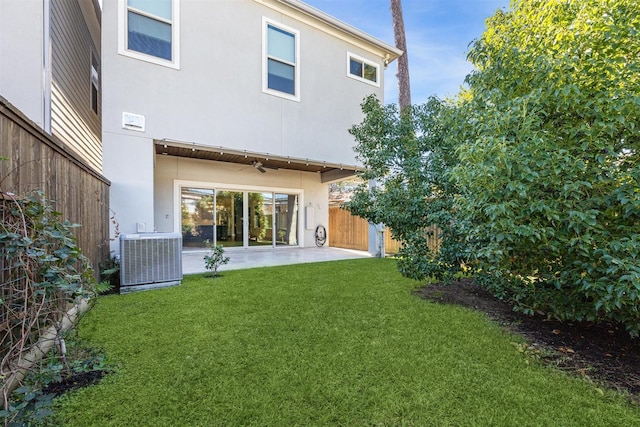 7706 Janak Dr Unit C, Houston, TX 77055 - rear view of house featuring stucco siding and a patio area