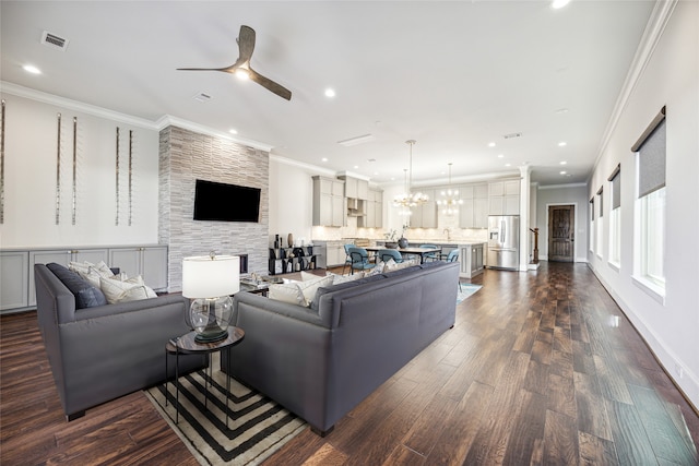 7706 Janak Dr Unit C, Houston, TX 77055 - living room featuring a ceiling fan, crown molding, a chandelier, dark wood-style floors, and recessed lighting