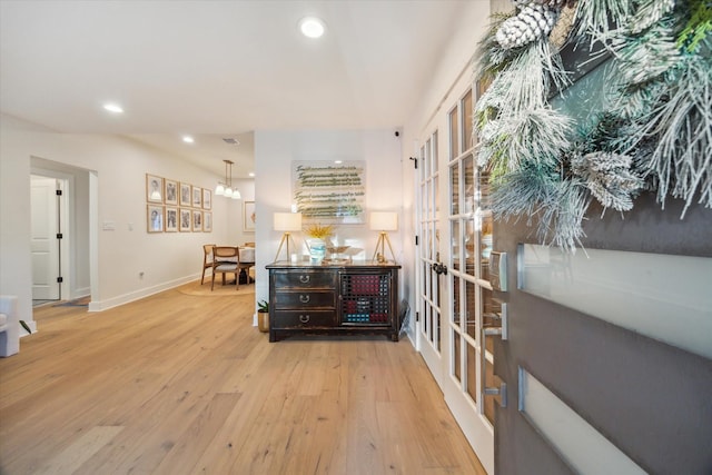 2022 Chaparral Dr, Houston, TX 77043 - corridor featuring recessed lighting, hardwood / wood-style floors, and french doors