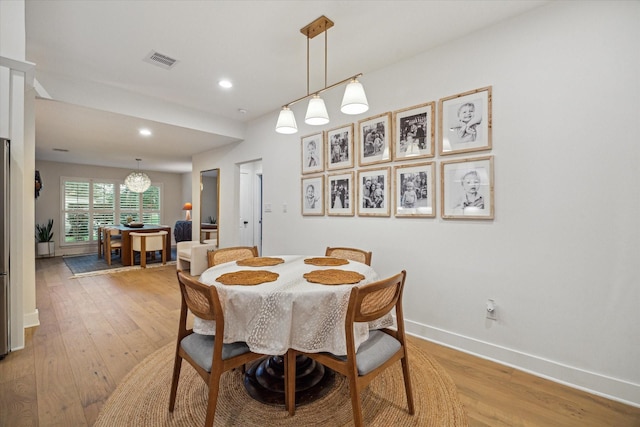 2022 Chaparral Dr, Houston, TX 77043 - dining area with light wood finished floors and recessed lighting