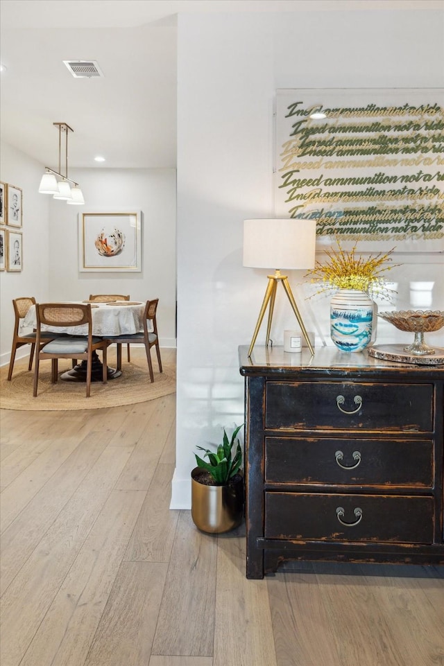 2022 Chaparral Dr, Houston, TX 77043 - hallway with light wood finished floors and recessed lighting