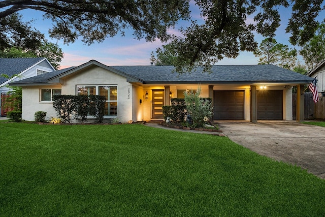 2022 Chaparral Dr, Houston, TX 77043 - view of front of home featuring stucco siding, a garage, and a shingled roof