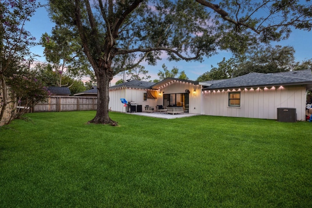 2022 Chaparral Dr, Houston, TX 77043 - back of house with a patio area, a shingled roof, and board and batten siding
