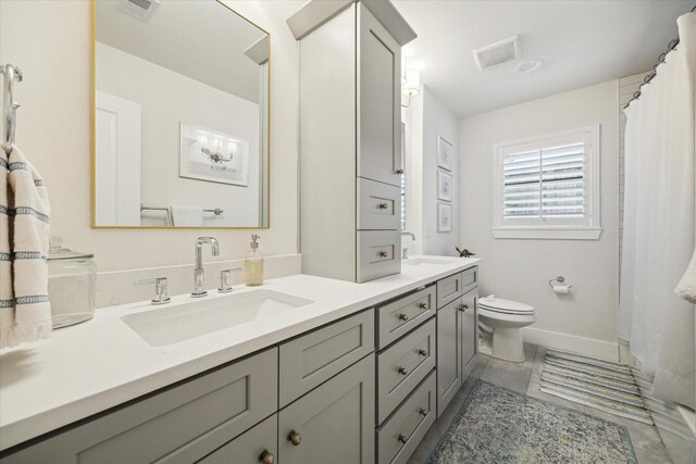 2022 Chaparral Dr, Houston, TX 77043 - full bath with double vanity and curtained shower