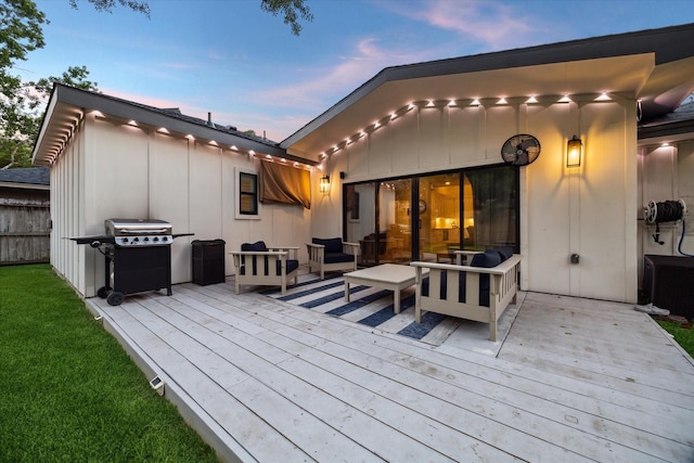 2022 Chaparral Dr, Houston, TX 77043 - deck at dusk with an outdoor hangout area and a grill