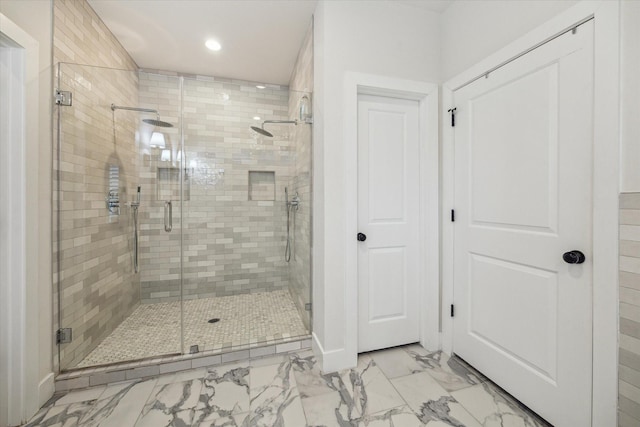 2022 Chaparral Dr, Houston, TX 77043 - full bathroom with marble finish floors, a stall shower, and recessed lighting