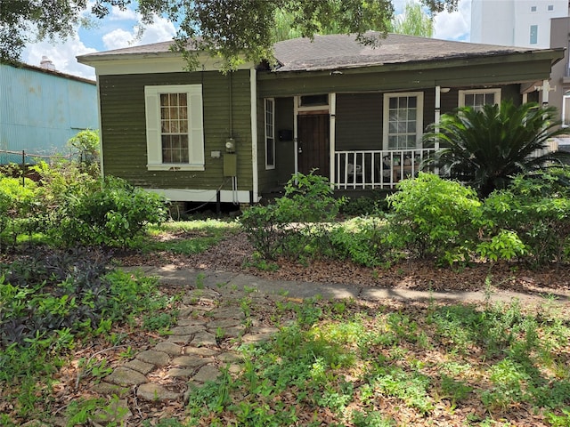 2509 St Emanuel St, Houston, TX 77004 - back of house with covered porch and a shingled roof
