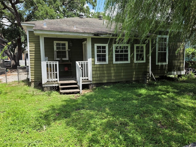 2509 St Emanuel St, Houston, TX 77004 - rear view of property with a shingled roof