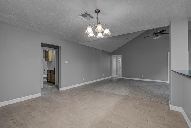 2440 Olympia Dr, West Columbia, TX 77486 - unfurnished room with ceiling fan, a textured ceiling, a chandelier, and vaulted ceiling