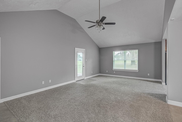 2440 Olympia Dr, West Columbia, TX 77486 - spare room with a ceiling fan, carpet floors, and high vaulted ceiling