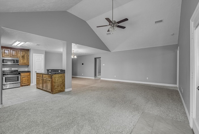 2440 Olympia Dr, West Columbia, TX 77486 - unfurnished living room with a ceiling fan, light colored carpet, and high vaulted ceiling