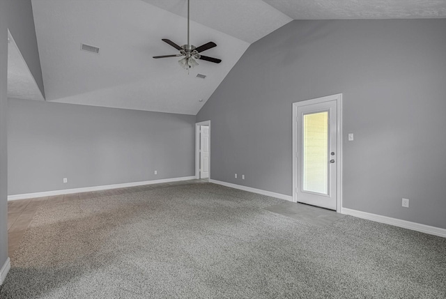 2440 Olympia Dr, West Columbia, TX 77486 - carpeted spare room with a ceiling fan and high vaulted ceiling