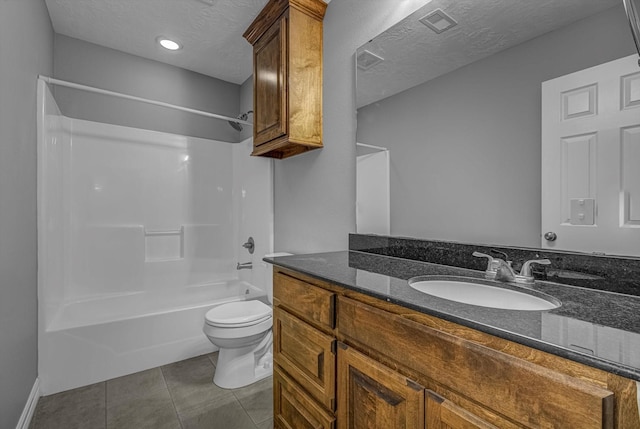 2440 Olympia Dr, West Columbia, TX 77486 - full bath with vanity, bathtub / shower combination, tile patterned flooring, and a textured ceiling
