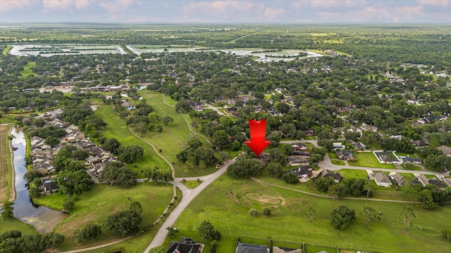 2440 Olympia Dr, West Columbia, TX 77486 - aerial view of property and surrounding area with a large body of water and nearby suburban area