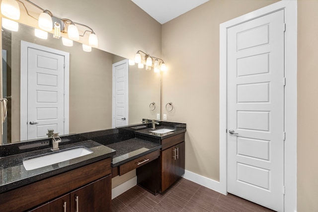 1801 Radcliffe St, Houston, TX 77007 - bathroom featuring double vanity and tile patterned floors