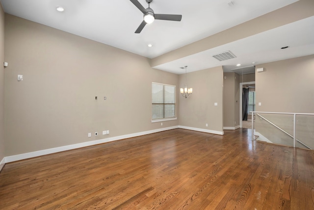 1801 Radcliffe St, Houston, TX 77007 - spare room featuring a chandelier, wood finished floors, a ceiling fan, and recessed lighting