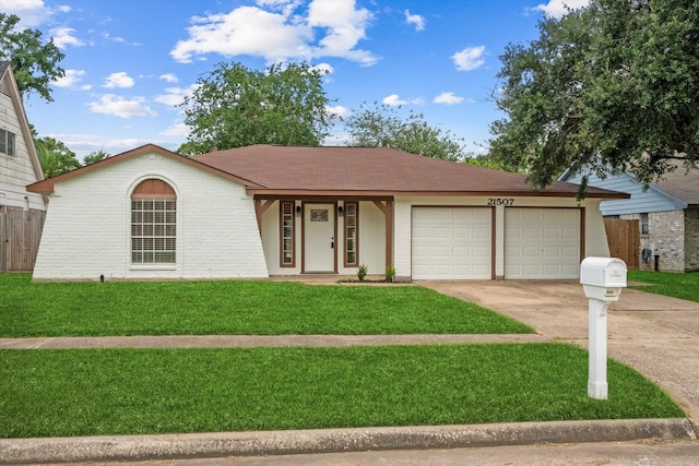 21507 Glenbranch Dr, Spring, TX 77388 - view of front of property with driveway, an attached garage, and a shingled roof