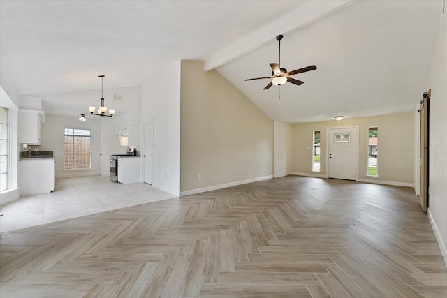 21507 Glenbranch Dr, Spring, TX 77388 - unfurnished living room with a chandelier, plenty of natural light, and a ceiling fan
