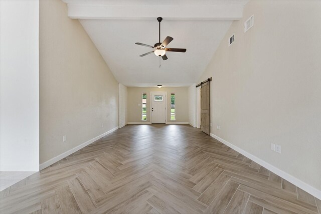21507 Glenbranch Dr, Spring, TX 77388 - empty room with a barn door, ceiling fan, high vaulted ceiling, and beamed ceiling