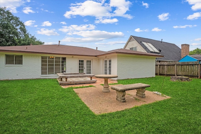 21507 Glenbranch Dr, Spring, TX 77388 - rear view of property with french doors and brick siding