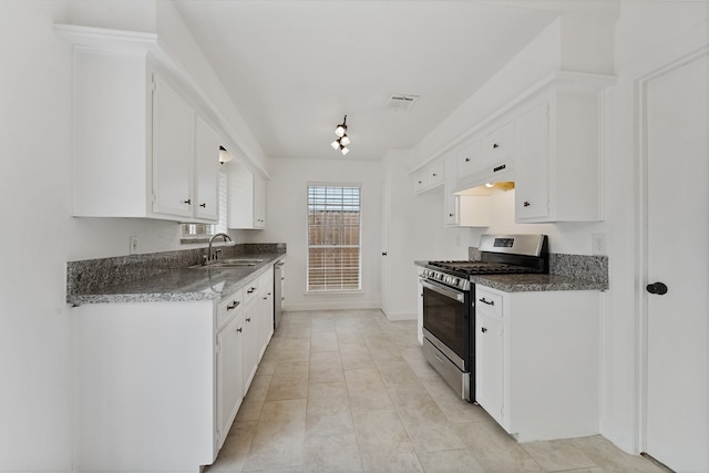 21507 Glenbranch Dr, Spring, TX 77388 - kitchen with stainless steel appliances, white cabinetry, custom range hood, dark stone counters, and light tile patterned flooring