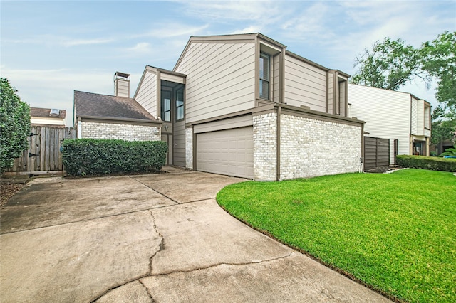 16606 Neumann Dr, Houston, TX 77058 - view of side of property featuring an attached garage, driveway, and brick siding
