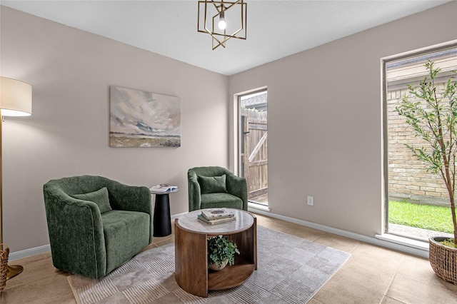 16606 Neumann Dr, Houston, TX 77058 - sitting room featuring healthy amount of natural light and light tile patterned floors