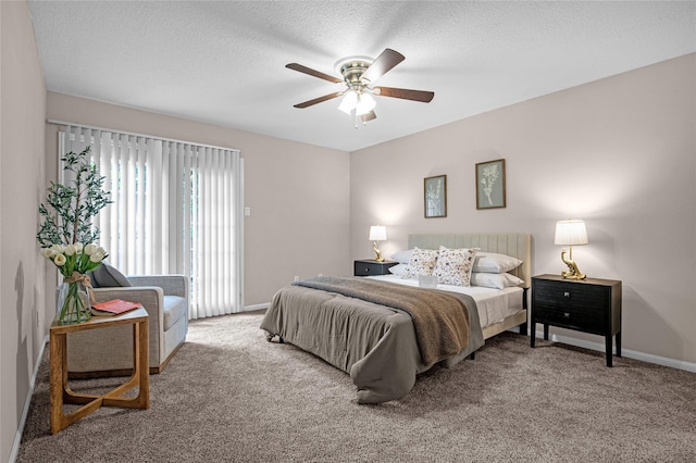 16606 Neumann Dr, Houston, TX 77058 - bedroom featuring carpet, ceiling fan, and a textured ceiling