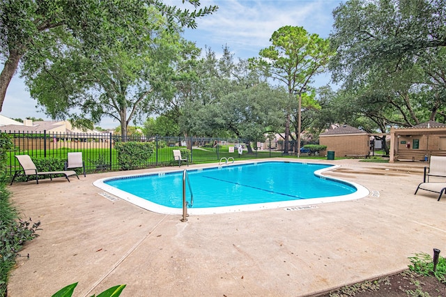 16606 Neumann Dr, Houston, TX 77058 - community pool featuring a patio area