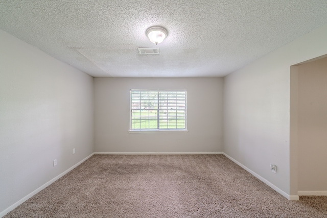463 Dover Ln, Spring, TX 77373 - unfurnished room with carpet floors and a textured ceiling