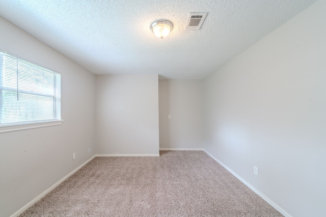 463 Dover Ln, Spring, TX 77373 - empty room with carpet floors and a textured ceiling