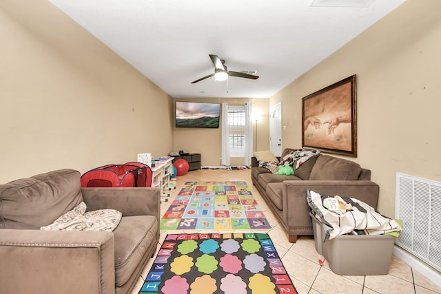 4827 Dalmatian Dr, Houston, TX 77045 - living room with light tile patterned flooring and ceiling fan