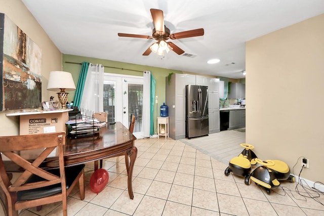 4827 Dalmatian Dr, Houston, TX 77045 - dining room featuring french doors, light tile patterned flooring, a ceiling fan, and recessed lighting