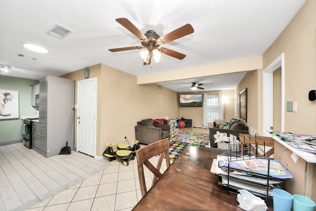 4827 Dalmatian Dr, Houston, TX 77045 - dining room featuring a ceiling fan and light tile patterned flooring