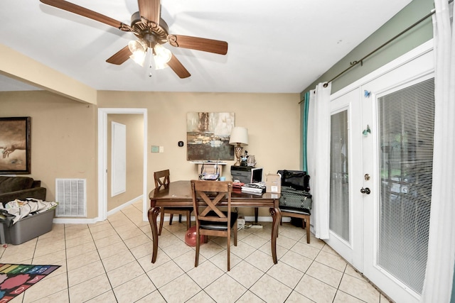 4827 Dalmatian Dr, Houston, TX 77045 - dining area with light tile patterned flooring, a ceiling fan, and french doors