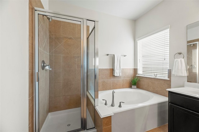 13215 Dover Bluff Dr, Rosharon, TX 77583 - bathroom with vanity, a garden tub, and a shower stall