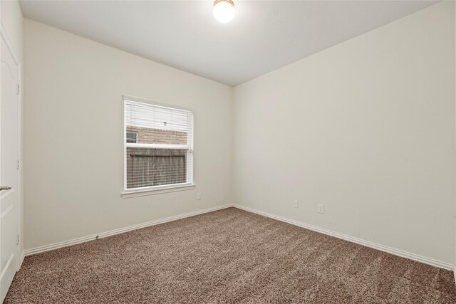 13215 Dover Bluff Dr, Rosharon, TX 77583 - carpeted empty room featuring baseboards