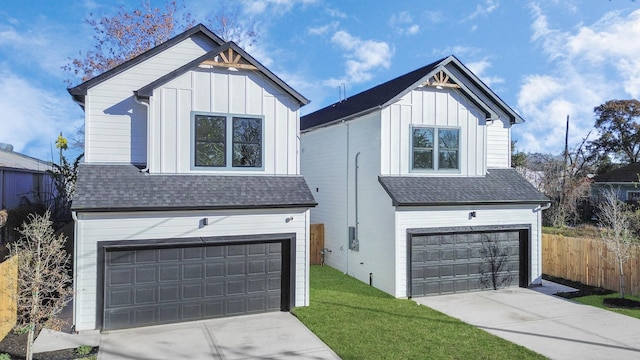 2213 Lee St, Houston, TX 77026 - modern inspired farmhouse with an attached garage, board and batten siding, concrete driveway, and roof with shingles