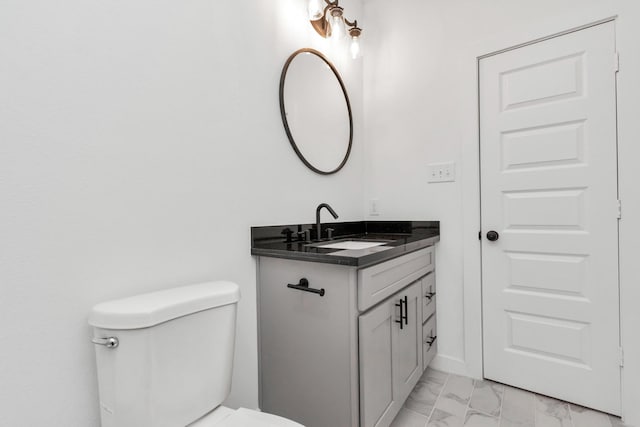 2213 Lee St, Houston, TX 77026 - bathroom featuring marble finish floors and vanity