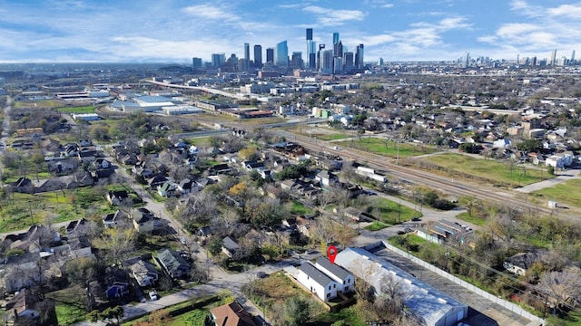 2213 Lee St, Houston, TX 77026 - aerial overview of property's location featuring city skyline