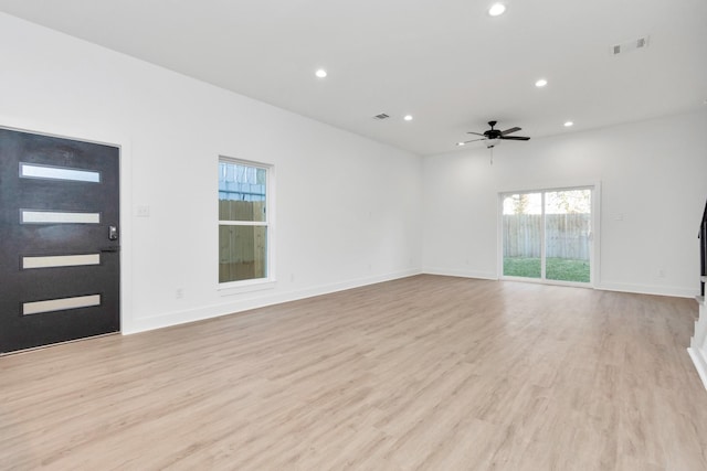2213 Lee St, Houston, TX 77026 - empty room with recessed lighting, light wood-type flooring, and ceiling fan