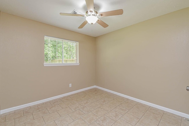 1011 Minnesota St, South Houston, TX 77587 - empty room with a ceiling fan and light tile patterned flooring