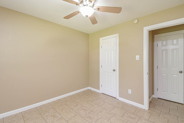 1011 Minnesota St, South Houston, TX 77587 - unfurnished bedroom featuring light tile patterned flooring and ceiling fan