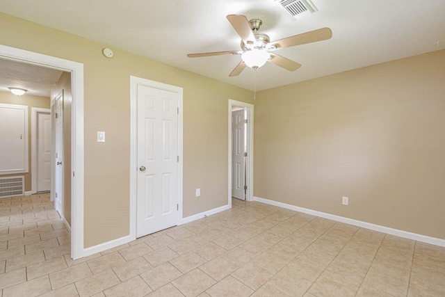 1011 Minnesota St, South Houston, TX 77587 - unfurnished bedroom with light tile patterned flooring and ceiling fan
