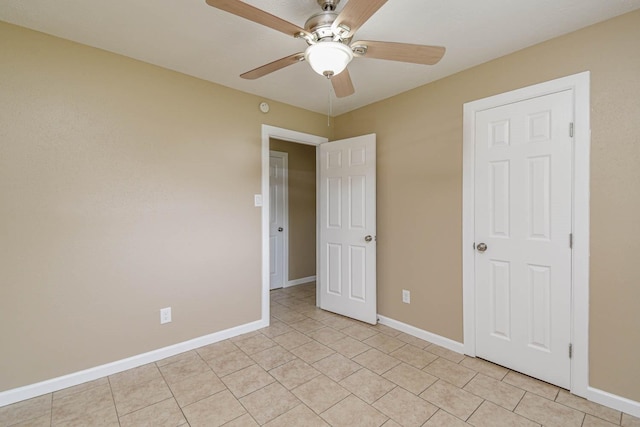 1011 Minnesota St, South Houston, TX 77587 - unfurnished bedroom featuring light tile patterned floors and ceiling fan