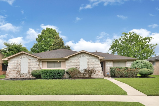9306 Claridge Dr, Houston, TX 77031 - ranch-style house featuring a front yard, brick siding, and a shingled roof