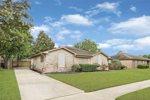 9306 Claridge Dr, Houston, TX 77031 - view of front of home featuring brick siding, driveway, and a gate
