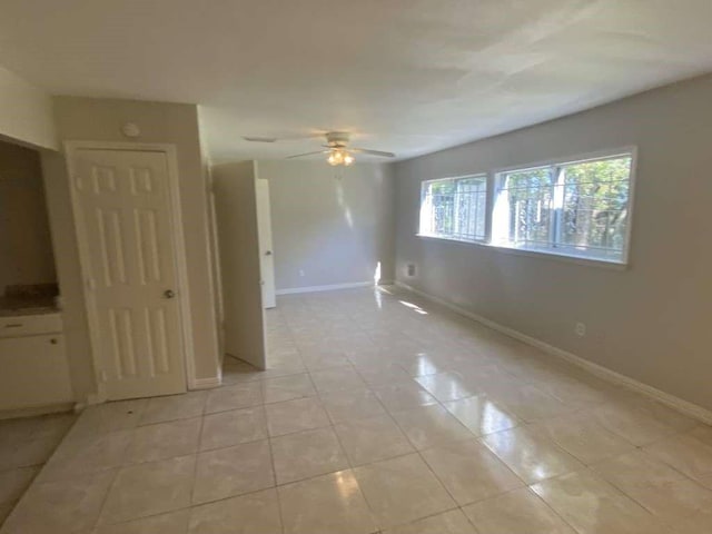 5131 Nassau Rd, Houston, TX 77021 - empty room with light tile patterned flooring and ceiling fan